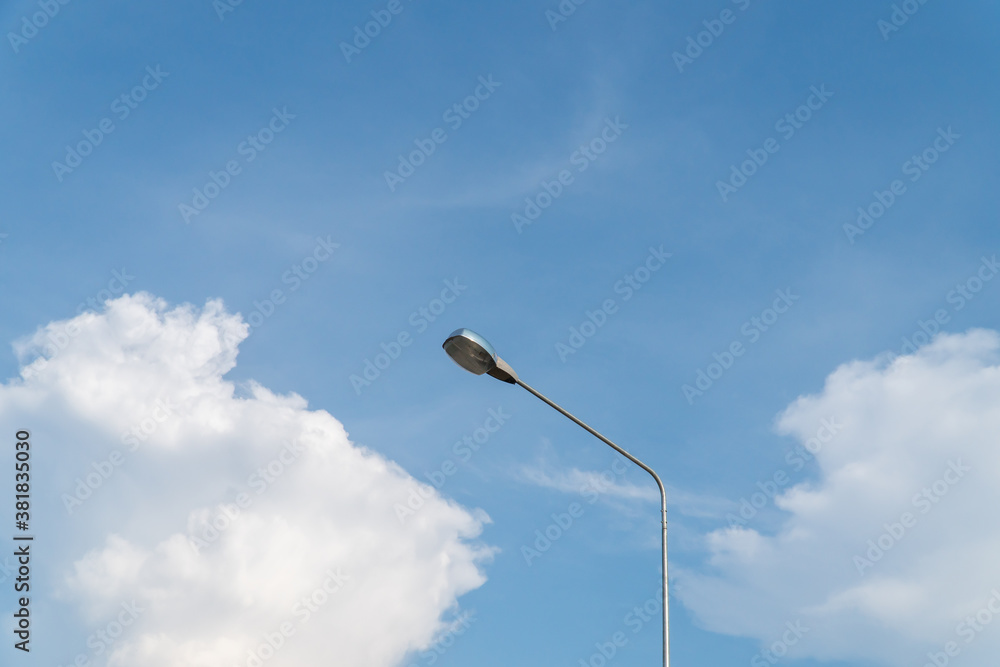 Street lamp at sideway with beautiful sky and clouds pattern in background with copy space.