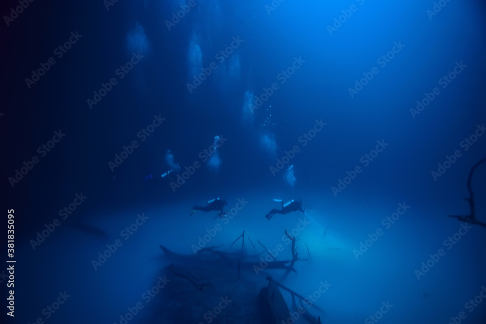 diving in the cenotes, mexico, dangerous caves diving on the yucatan, dark cavern landscape underwater diving in the cenotes, mexico, dangerous caves diving on the yucatan, dark cavern landscape underwater