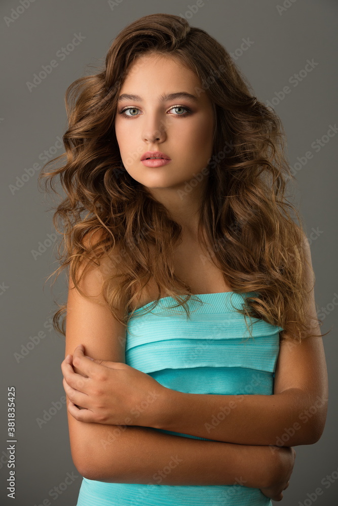 Fototapeta premium Lovely girl in a beautiful dress
