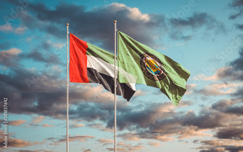 Valokuva Waving flags of Gulf Cooperation Council of the Persian Gulf States - Bahrain, Kuwait, Oman, Qatar, Saudi Arabia, and the United Arab Emirates - except Iraq at sunset sky background