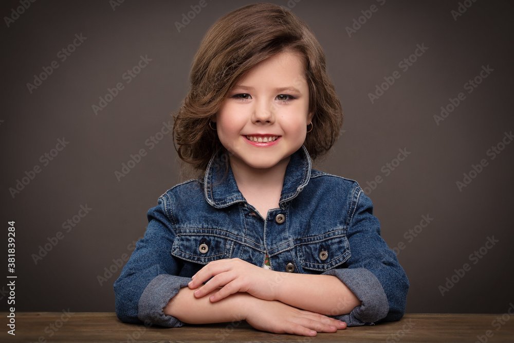portrait of a beautiful girl with a stylish hairstyle