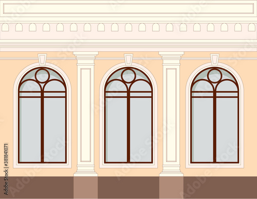 Facade of the building, one floor with windows and decorative elements of a column, balustrade.