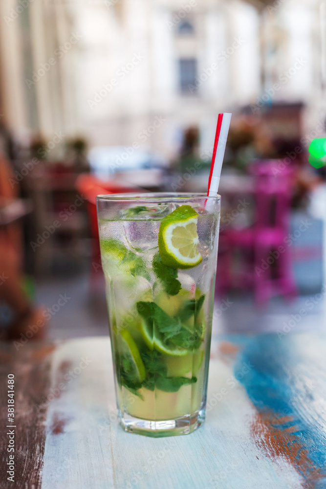 Non-alcoholic or alcoholic mojito on table at summer cafe Non-alcoholic or alcoholic mojito on table at summer cafe
