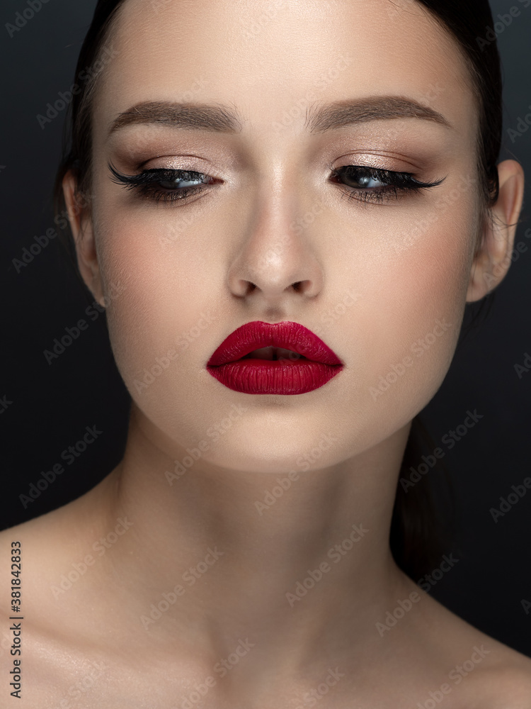 Portrait of young beautiful woman with red lips Portrait of young beautiful woman with red lips