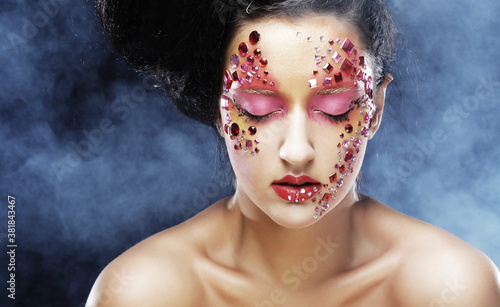 woman with bright artistic make-up