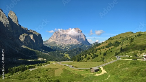 Val Gardena, Italy - 09/15/2020: Scenic alpine place with magical Dolomites mountains in background, amazing clouds and blue sky in Trentino Alto Adige region, Italy, Europe