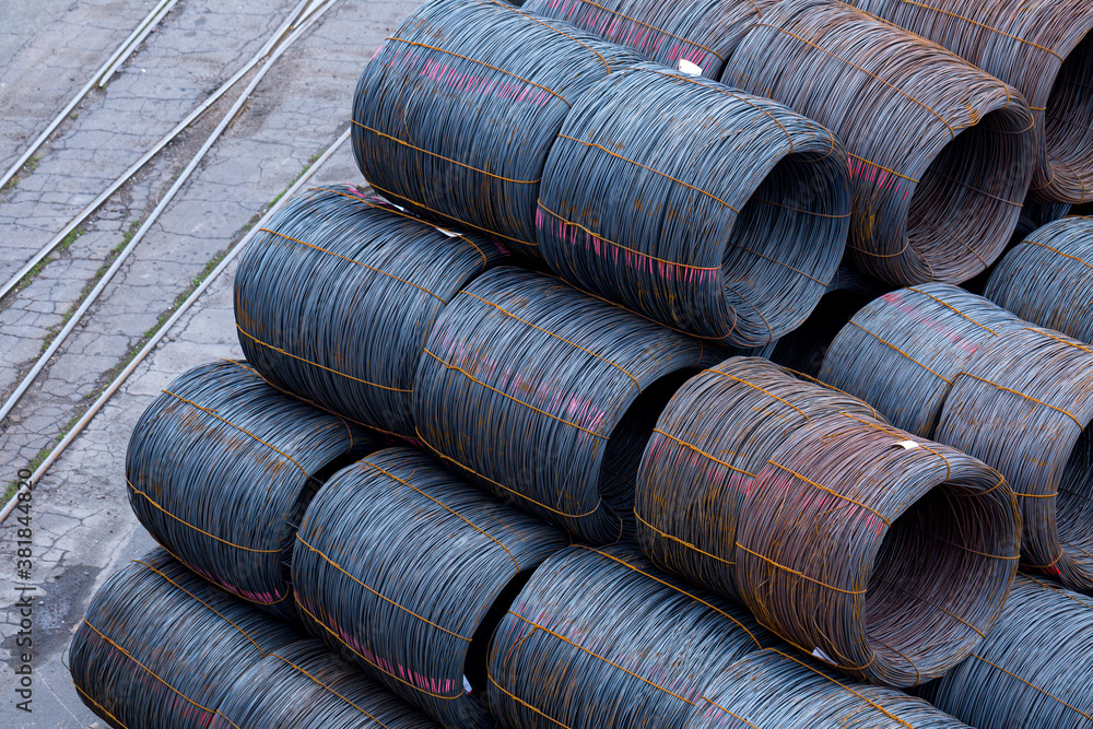 Steel low carbon wire rod, hot rolled steel drawing wire twelve millimeters or half an inch in diameter in coils. Freight transportation of heavy industry products by seaports. Export-import activity. Steel low carbon wire rod, hot rolled steel drawing wire twelve millimeters or half an inch in diameter in coils. Freight transportation of heavy industry products by seaports. Export-import activity.