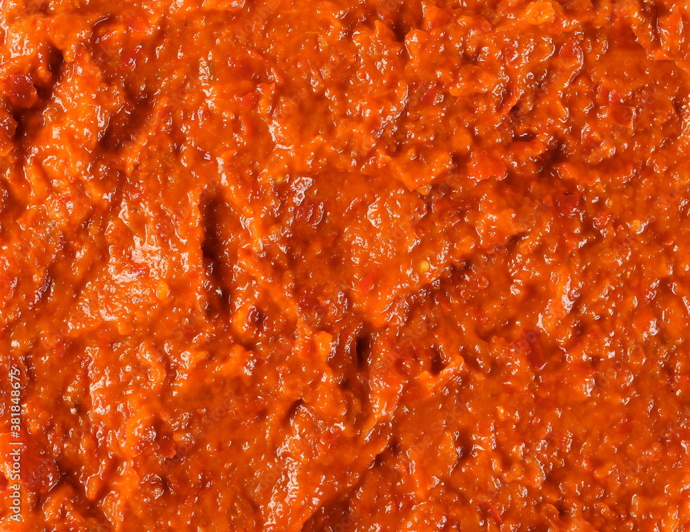 Ajvar, red paprika, pepper and eggplant dish background and texture Ajvar, red paprika, pepper and eggplant dish background and texture