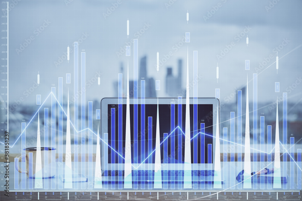 Stock market chart hologram drawn on personal computer background. Double exposure. Concept of investment. Stock market chart hologram drawn on personal computer background. Double exposure. Concept of investment.