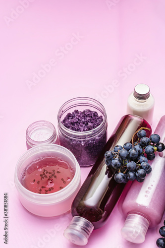 Natural spa accessories with ripe grapes