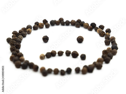 Black pepper emoticon sad. Isolated tasty, background herb, spice,  peppercorn emoticons for social media banner.