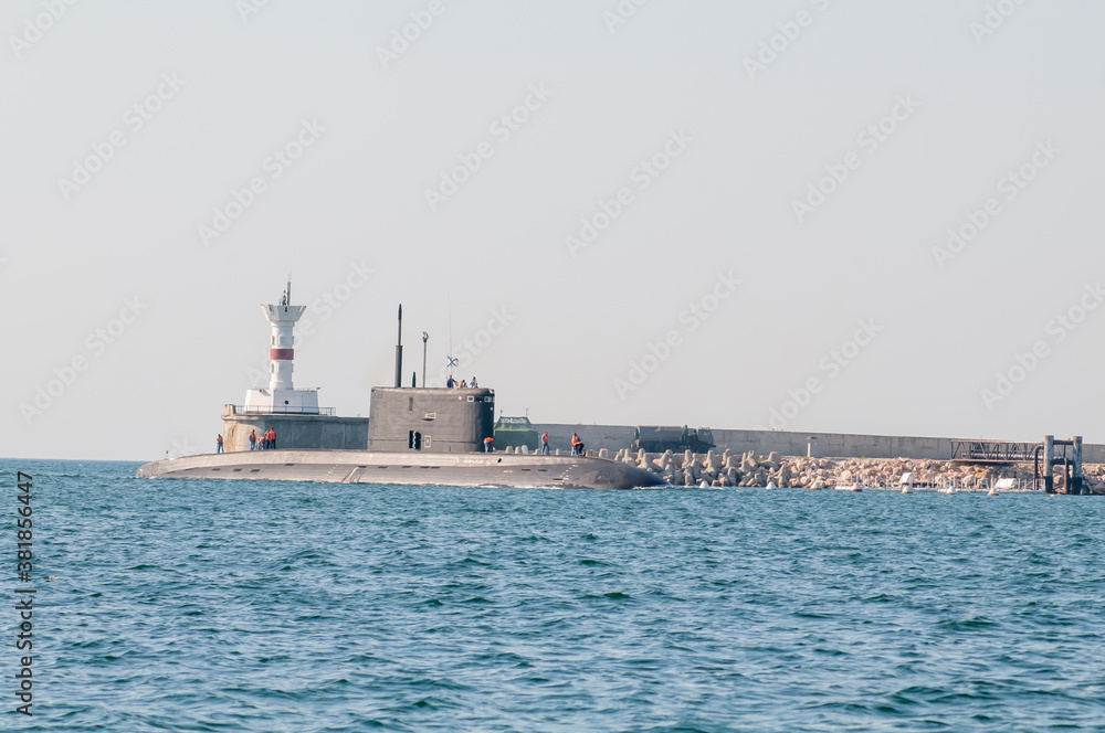 submarine sails in a surface position by sea
