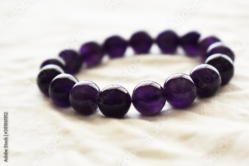 Amethyst bracelet crystal gemstone. Crystal gemstone for enhances intuition, spirituality, meditation, extremely protective, calms the mind and spirit, protects from nightmares and insomnia.   photo