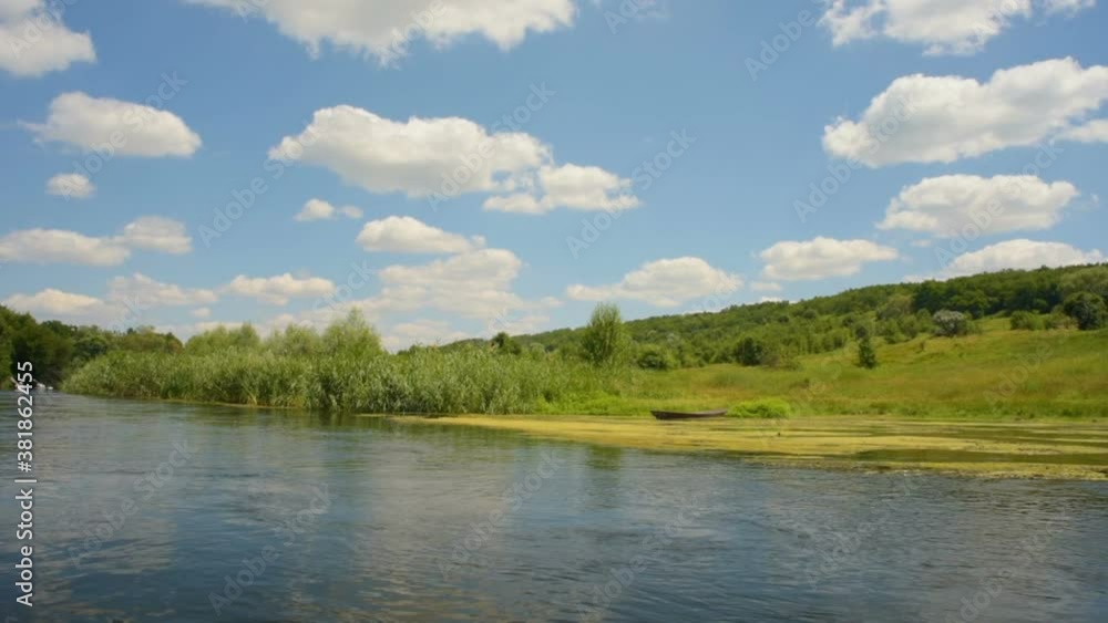 Calm river in green valley. concept of ecology , clear water, summer vacation, relaxation Calm river in green valley. concept of ecology , clear water, summer vacation, relaxation