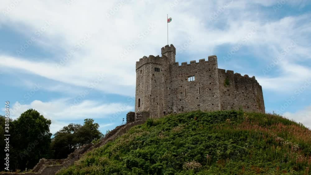 Stunning rotating shot around Cardiff Castle in Wales, UK progressively lit by sunlight. Its construction dates back to 1081 Stunning rotating shot around Cardiff Castle in Wales, UK progressively lit by sunlight. Its construction dates back to 1081