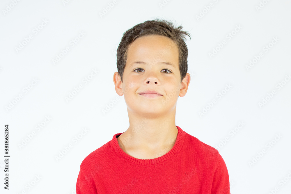 Close up portrait of a happy boy smiling on white background Close up portrait of a happy boy smiling on white background