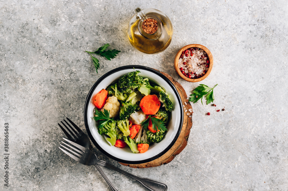 Steamed vegetables - broccoli,carrot and cauliflower Steamed vegetables - broccoli,carrot and cauliflower