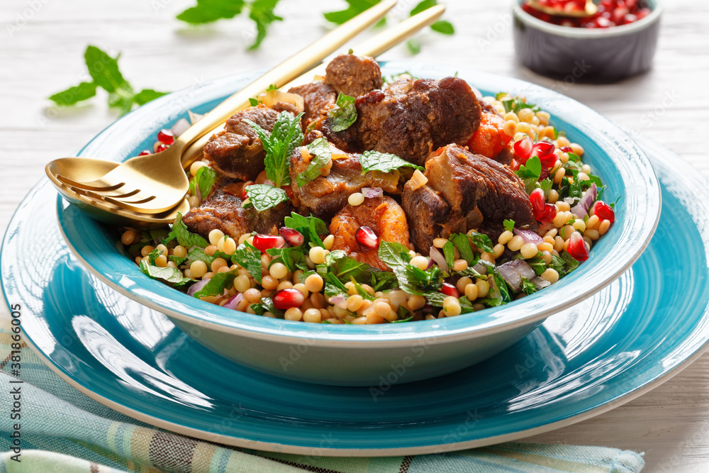 lamb stew with pearl couscous and pomegranate lamb stew with pearl couscous and pomegranate