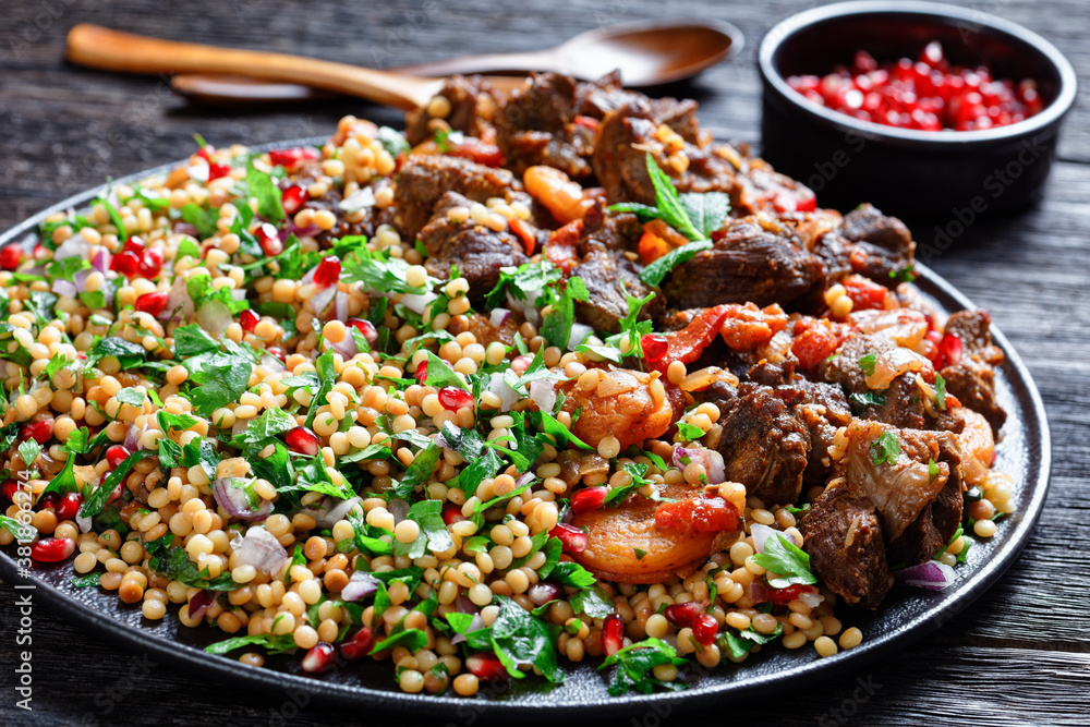 lamb stew with pearl couscous and pomegranate lamb stew with pearl couscous and pomegranate