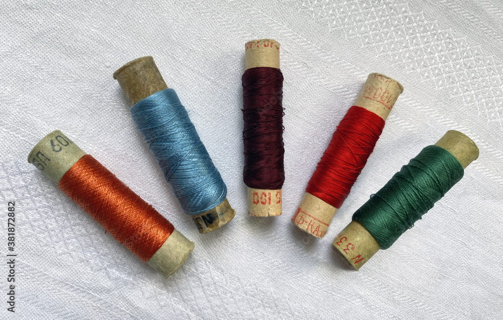 Old soviet spools with multi-colored silk threads Old soviet spools with multi-colored silk threads