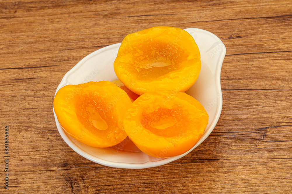 Marinated peaches fruit in the bowl