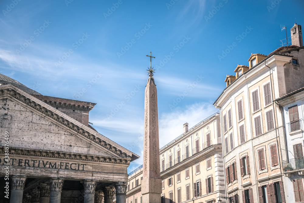 View from the piazza della Rotonda with the Pantheon and the Obelisk, historical buildings in background. Ancient roman temple now christian church. One of the most important monument in Rome, Italy.