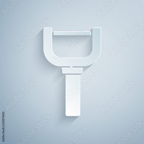 Paper cut Peeler icon isolated on grey background. Knife for cleaning of vegetables. Kitchen item, appliance. Paper art style. Vector.