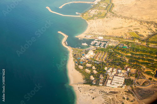 Photography Beautiful cityscape of Dubai from aeroplane window.