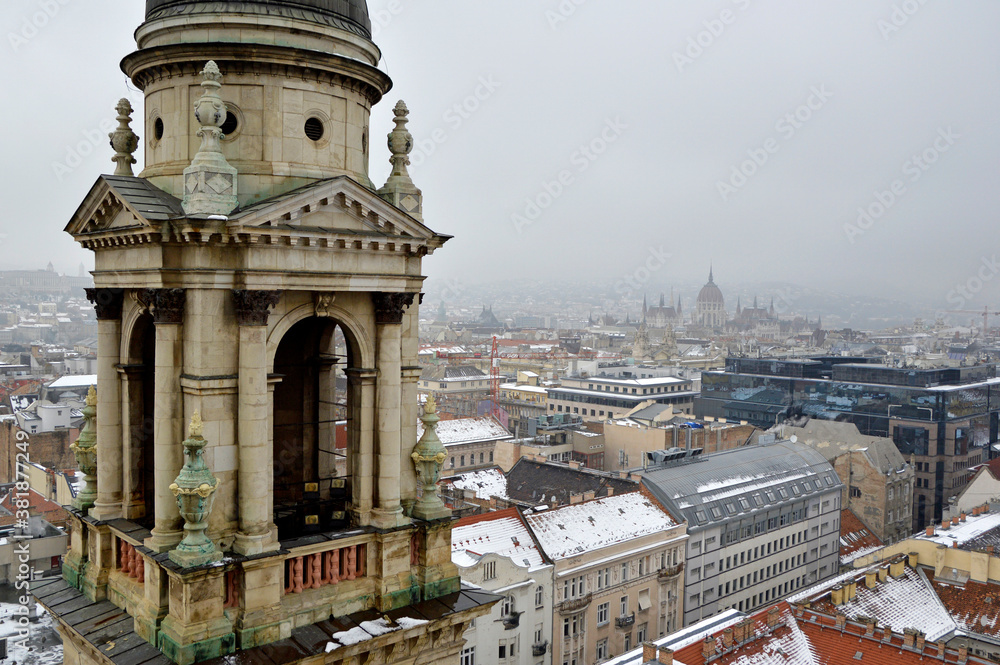 panoramic view of Budapest seen from the top of the tower of Saint Istvan church in foggy winter day