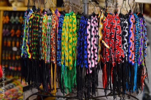 colorful striped strings sold at the market stall