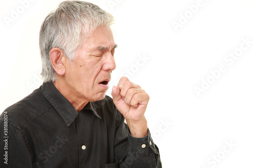 senior Japanese man coughing