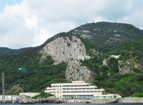 Fotografie Crimea, Greater Yalta, Oreanda, July, 2018: sanatorium on the rocky shore of Ore