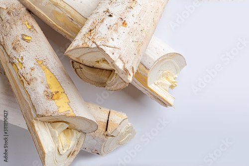 Natural pupunha palm heart (stem) on white background. Top view. Selective focus. Space for text photo