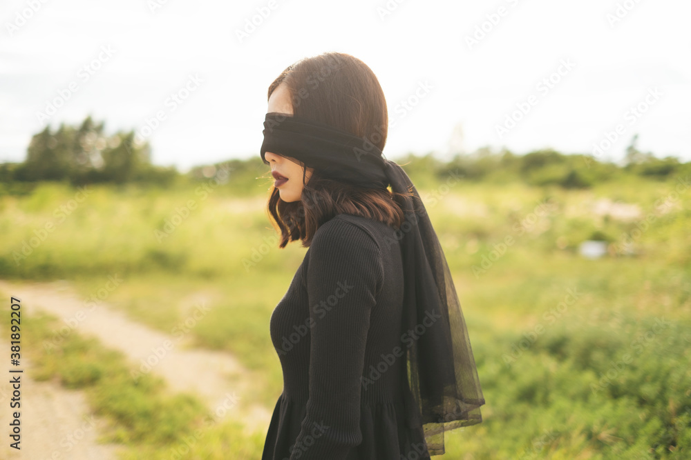 Portrait of blindfold witch with black veil - halloween theme. Portrait of blindfold witch with black veil - halloween theme.