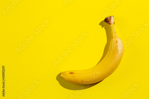 Banana fruit on background of yellow. Concept of freshness and healthy food.