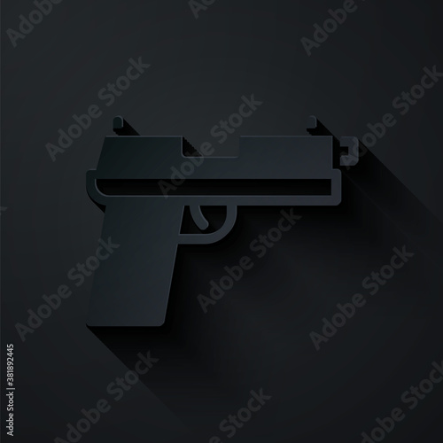 Paper cut Pistol or gun icon isolated on black background. Police or military handgun. Small firearm. Paper art style. Vector.