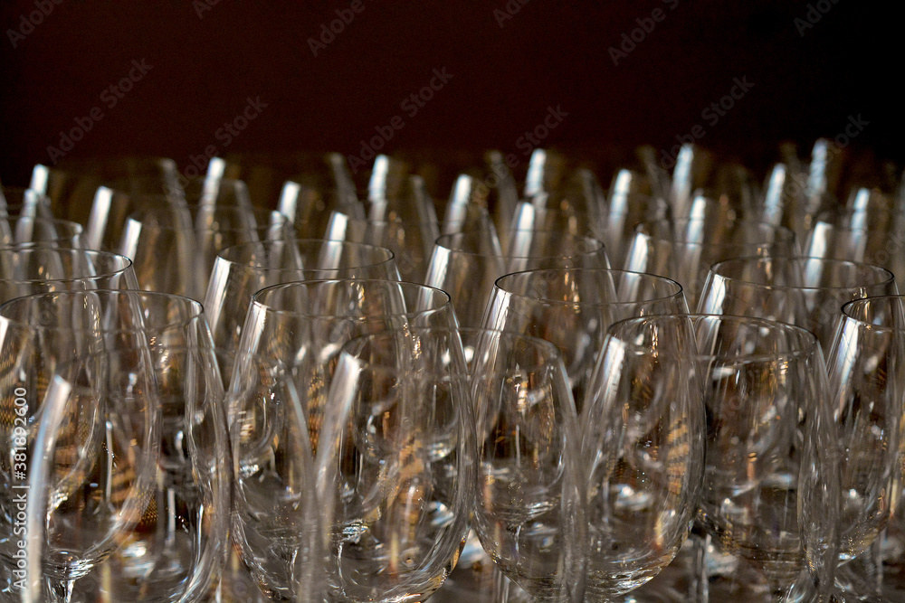 Many clean wine glasses in the bar Many clean wine glasses in the bar