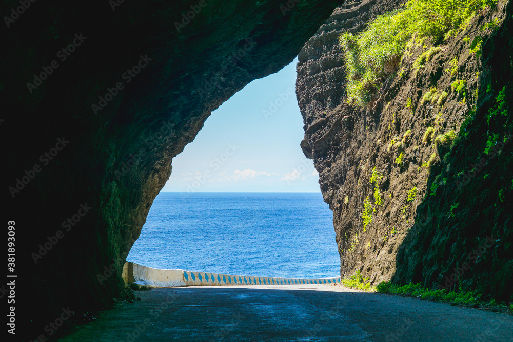 scene of pacific ocean through the tunnel in lanyu, taitung, taiwan
