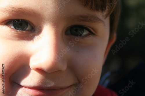 close-up of a blue-eyed boy photo