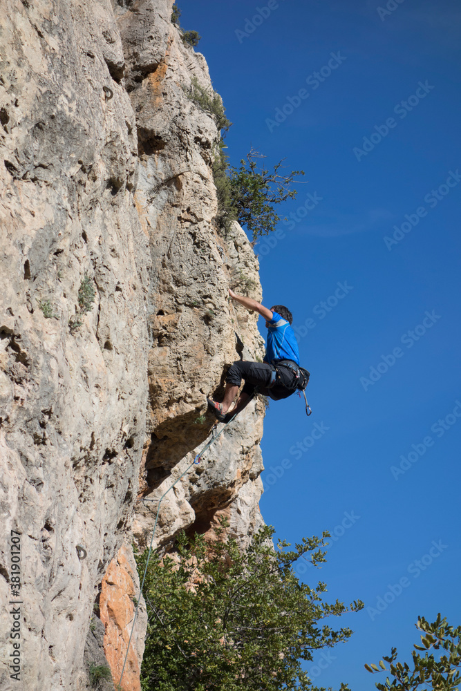 people practicing mountain climbing outdoors