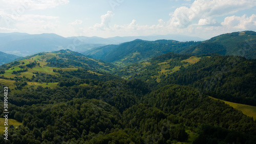 Fototapeta Naklejka Na Ścianę i Meble -  Beautiful green mountain landscape with trees on it