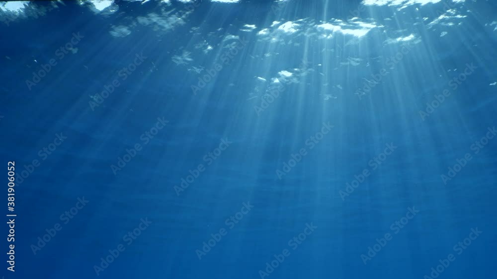 sun ray and sun beam scenery underwater waves on surface of water slow ocean scenery sun ray and sun beam scenery underwater waves on surface of water slow ocean scenery