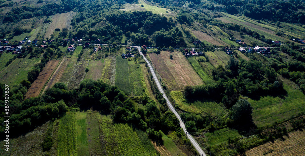 Aerial view of two country roads meeting in a T-intersection