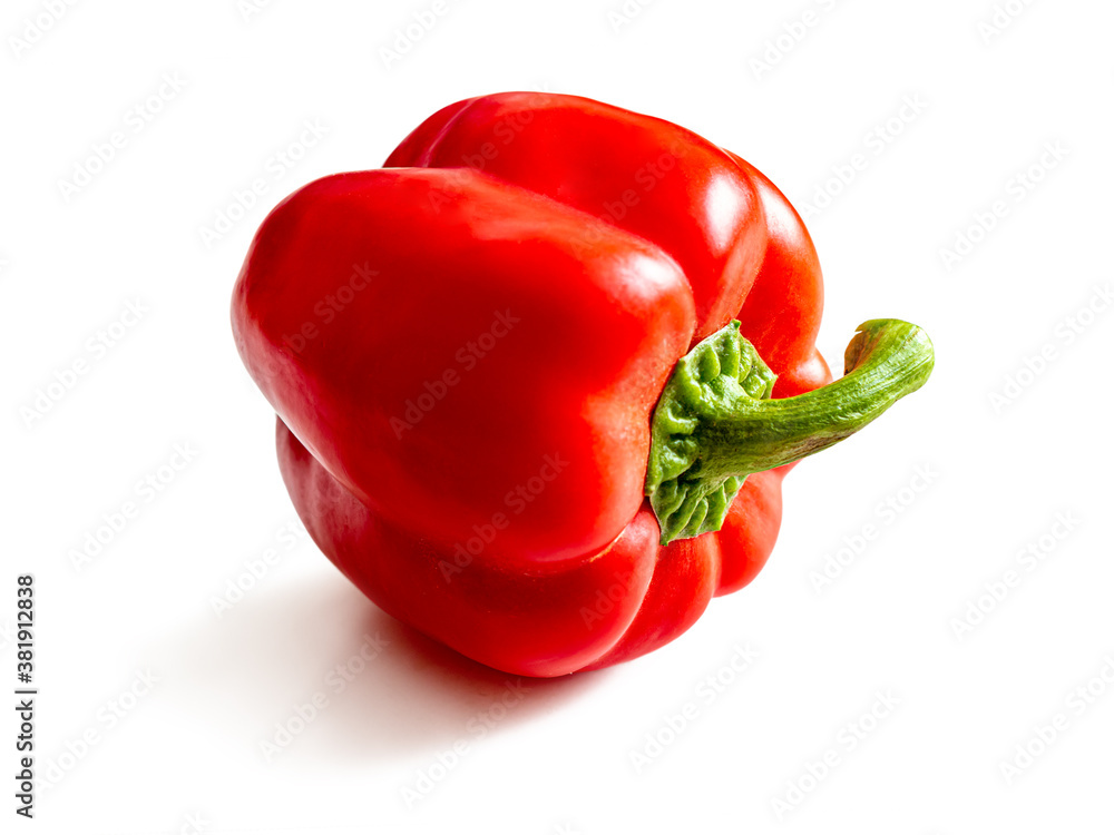 Ripe bell pepper with a shiny red skin on a white Ripe bell pepper with a shiny red skin on a white