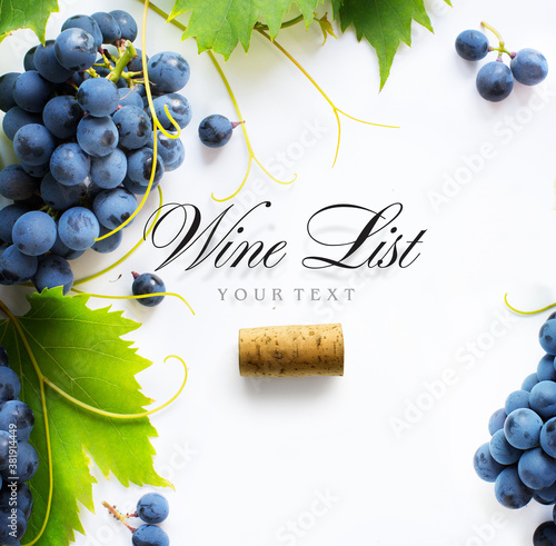Billede på lærred wine list background; sweet black grapes and bottle cork