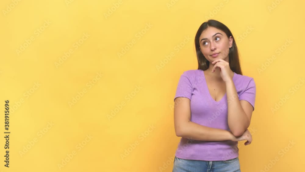 Young caucasian woman looking sideways with doubtful and skeptical expression Young caucasian woman looking sideways with doubtful and skeptical expression