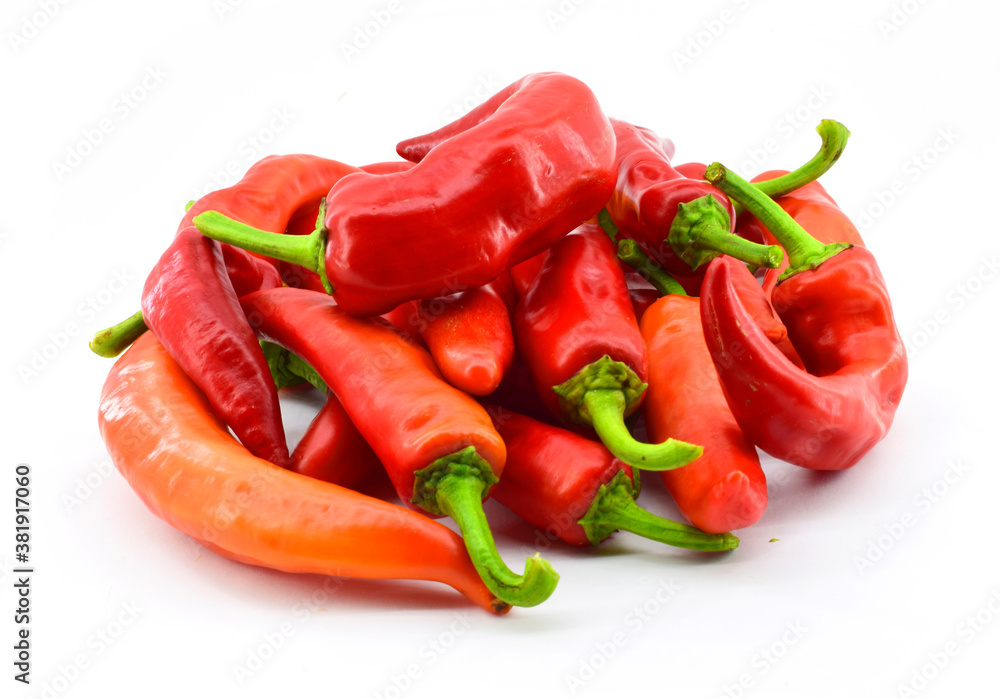 The heap of hot chili peppers isolated on white background