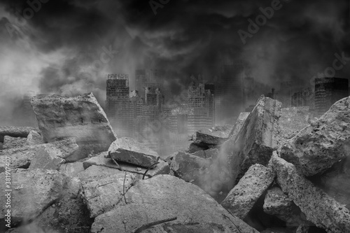 The ruins of concrete and brick rubble in front of the large city building are covered with smoke from the civil war and the city abandonment, concept of war photo