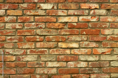 Grunge red brick wall background horizontal. Old brick wall or fence.