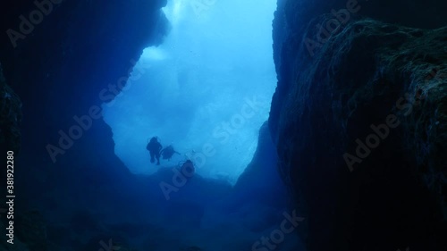 Wallpaper Mural scuba divers exploring the reefs and underwater with rocks ocean scenery enjoying topography mediterranean sea Torontodigital.ca